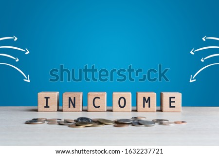 Financial wealth multiple streams concept on wood blocks with copy space - Money growth and personal income revenue - Savings investments and passive earnings - Opportunity, finance and funds concepts