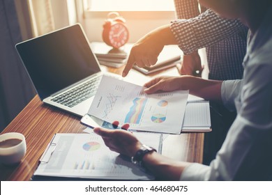 Financial,accounting,investment advisor consulting with her team at office. - Shutterstock ID 464680475