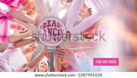 Find out more button with Magnifyied text on Breast Cancer Awareness women'd hands together