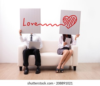 Find Ture Love On Internet - Man And Woman Using Computer And Digital Tablet On Sofa