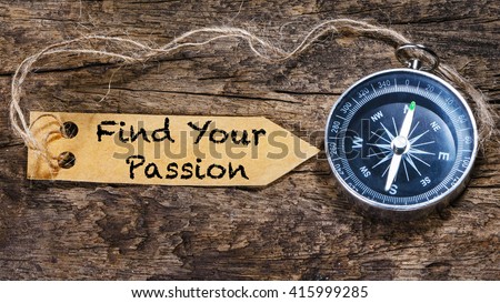 Find your passion - motivation phrase handwriting on label with compass


