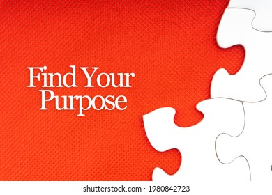 FIND YOUR PURPOSE text with jigsaw puzzle on red background. Business and Motivation Concept