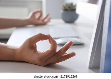 Find Zen. Woman Taking Break From Work At Table Indoors, Closeup