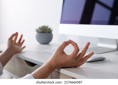 Find Zen. Woman Taking Break From Work At Table Indoors, Closeup