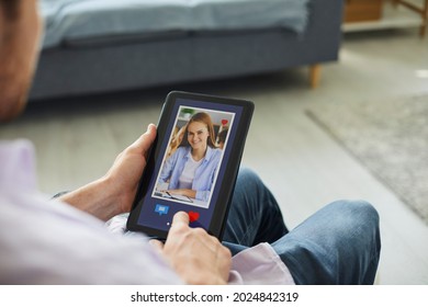 Finding Love Online. Man Looking At Profile Pic Of Pretty Young Woman On Tablet Display. Guy Gives A Like And Sends Message To Beautiful Girl On Modern Dating Website Or Mobile App. Close Up, Closeup