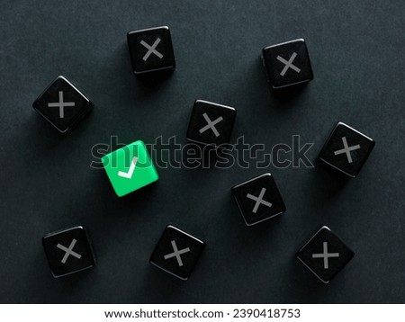 Finding the right solution or to find the correct answer. Approval. Voting yes. Best decision, choice or option. Check mark and cross symbols on black cubes.