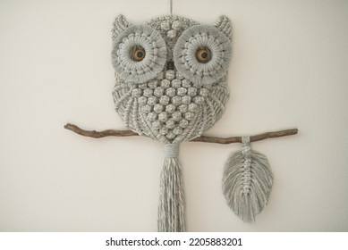fine art macramé owl model on branch children's room wall decoration cotton cord material macrame knotting technique wall hanging - Shutterstock ID 2205883201