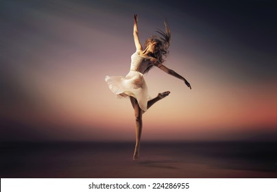 Fine art photo of a beautiful girl dancing
