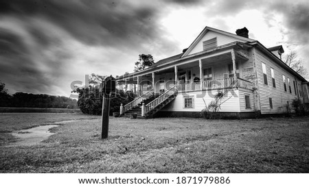 Fine art photo - Haunted house in the Mississippi Delta sits abandoned in this long exposure photograph