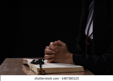 Fine Art Portrait Of A Novice Nun In Deep Prayer With Rosary