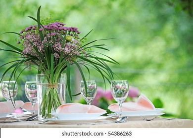 Fine Banquet Table Setting With Bouquet