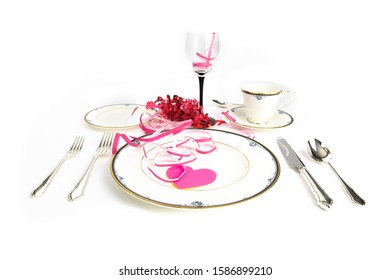 A Fine China Place Setting For Valentines Dinner Isolated On White