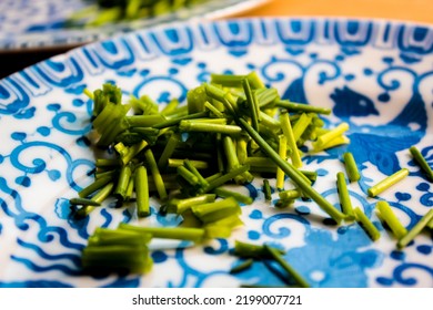 Fine China Plates With Freshly Cut Chives.