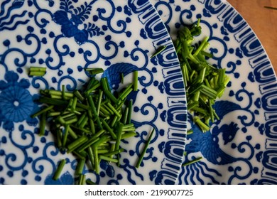 Fine China Plates With Freshly Cut Chives.