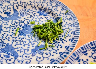 Fine China Plates With Freshly Cut Chives.