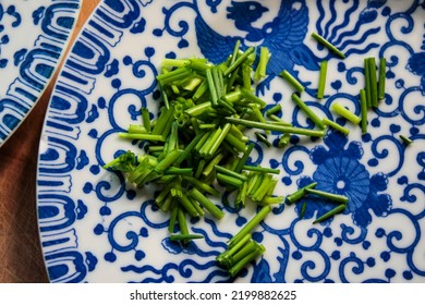 Fine China Plates With Freshly Cut Chives.