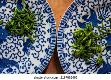 Fine China Plates With Freshly Cut Chives.