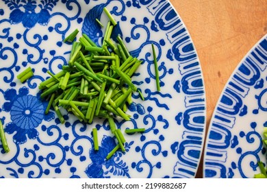 Fine China Plates With Freshly Cut Chives.