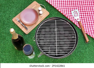 Fine Dining With Champagne Wine On The Summer Fresh Lawn. Outdoor Backyard BBQ Holiday Grill Party Or Weekend Picnic Concept. Overhead View