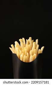 Fine French Fries On Black Background Isolated Inside Carton Box