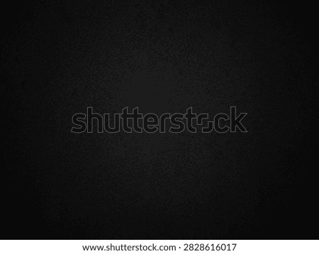 ​Black fine grain texture background with subtle vignetting for design element