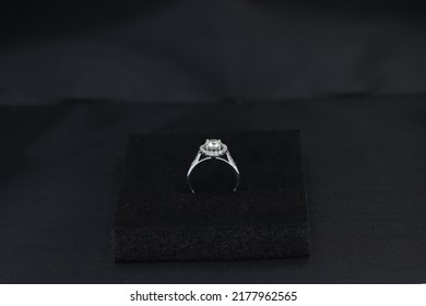 Fine Jewelry As Diamond Ring With Diamond With Black Satin Fabric Background. Jewelry Shop Concept