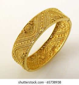 Fine Jewelry Gold Cuff Bracelet Isolated On White