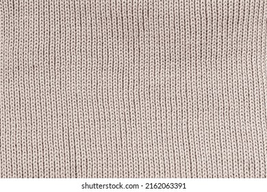 Fine Knit Pastel Cloth Texture. Beige Knitted Fabric Backdrop.  Fashion Background. Jersey Scarf Knit Backdrop. Warm Winter Sweater.