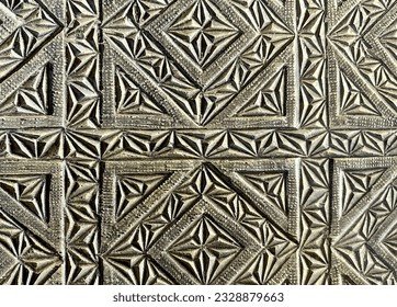 Fine medieval wood carving textured background, fragment of ancient handmade door, pattern with squares and triangles - Shutterstock ID 2328879663