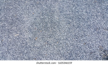 Fine Rock Texture On The Ground.