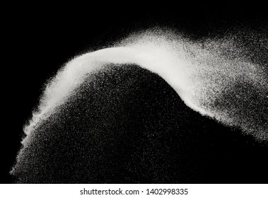 Fine sea salt splash explosion on black background ,stop motion food object design