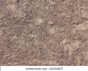 Fine Texture Of Brown Gravel On A Dirt Road
