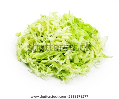 finely chopped fresh cabbage isolated on white background.
