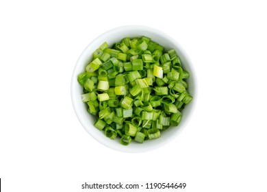 Finely Chopped Fresh Green Onions In A Generic Ceramic Ramekin Viewed From Above Isolated On White