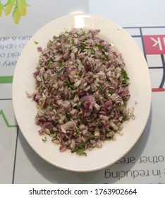 Finely Chopped Onions And Coriander Relish In A Tray