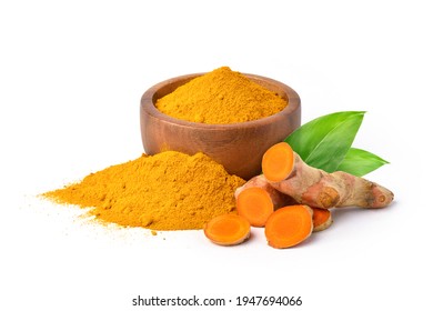 Finely dry Turmeric (Curcuma longa Linn) powder in wooden bowl with  rhizome (root) slices and leaves isolated on white background.
