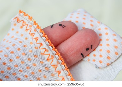 Finger art of couple. Couple after an argument looking in different directions. Couple with problem in bed. 