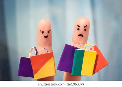 Finger art of a couple with shopping bags. Man is unhappy because he was tired of shopping.