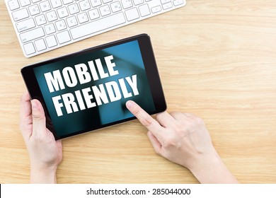 Finger Click Screen With Mobile Friendly Word With Keyboard On Wooden Table,Responsive Web Design