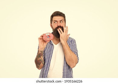 Finger licking good snack. Bearded man eat donut isolated on white. Hipster enjoy sweet snack. Enjoying snack break. Unhealthy food and snacking. Diet and dieting. Fun snack. Quick and sweet.