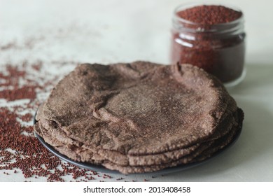 Finger Millet Indian Flat Bread Made Of Finger Miller Flour. A Healthy Gluten Free Alternate To Regular Wheat Flat Bread. Shot On White Background.