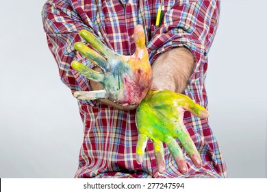 Finger Paint Game With Water Colored Palms Of An Adult