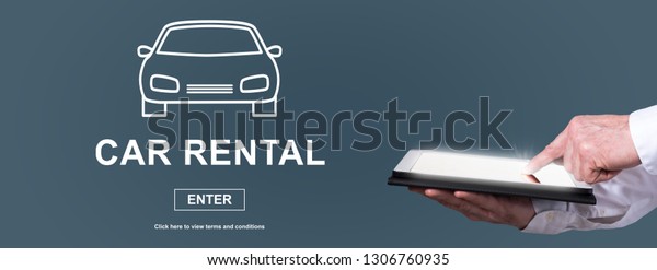 Finger pointing on digital tablet with car\
rental concept on\
background