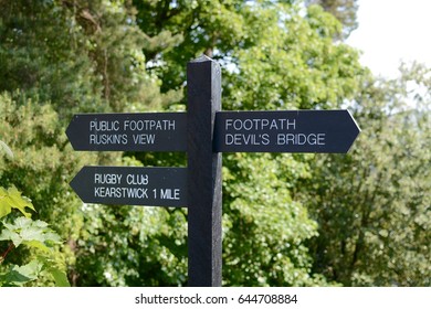 A finger post sign at Kirkby Lonsdale showing directions 