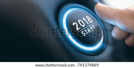 Finger pressing a 2018 start button. Concept of new year, two thousand eighteen. Composite between a photography and a 3D background. Horizontal image