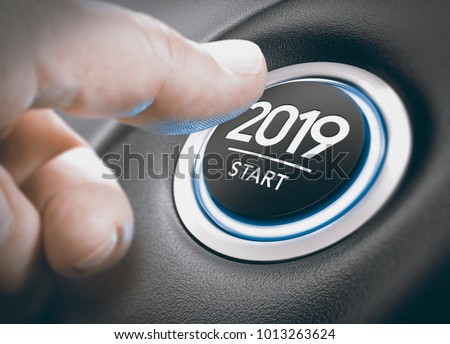 Finger pressing a 2019 start button. Concept of new year, two thousand nineteen. Composite between a photography and a 3D background