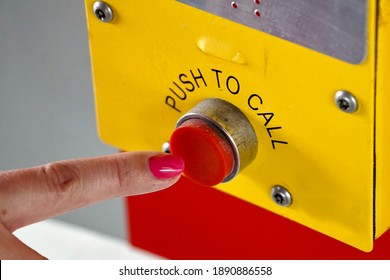 Finger pressing call button for help