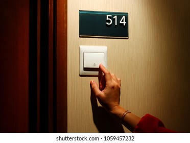 Finger Pressing Hotel Door Bell