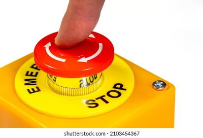 Finger Pressing Pushing A Simple Red Emergency Stop Push Button, Machine Rotation Release Safety Switch. Workplace Safety, Health Hazard, Worker Protection Abstract Symbol, Concept, Detail, Closeup