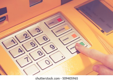 Finger Push On Enter Button At ATM Key Pad